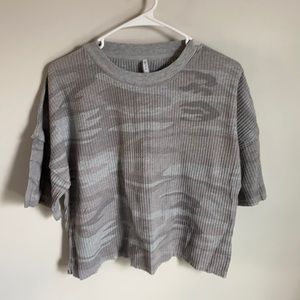 Waffle knit cropped camo T-shirt.